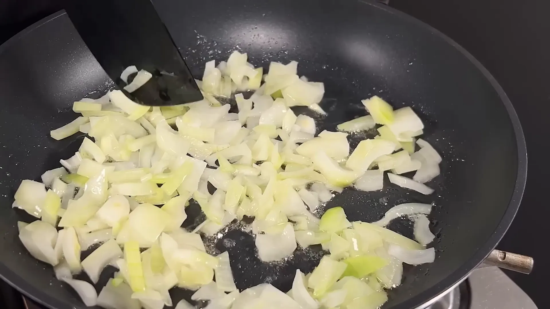 Sautéing garlic and herbs for chicken filling