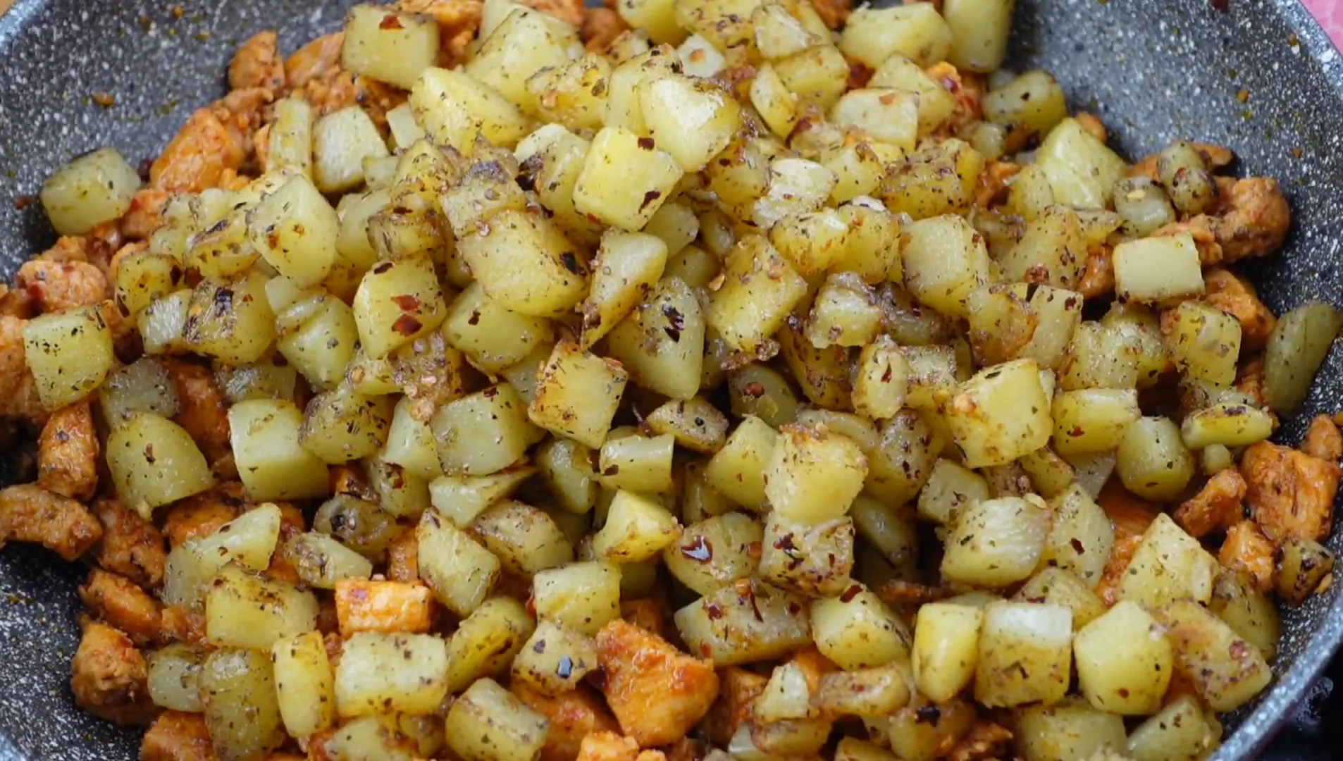 Seasoning the chopped potatoes