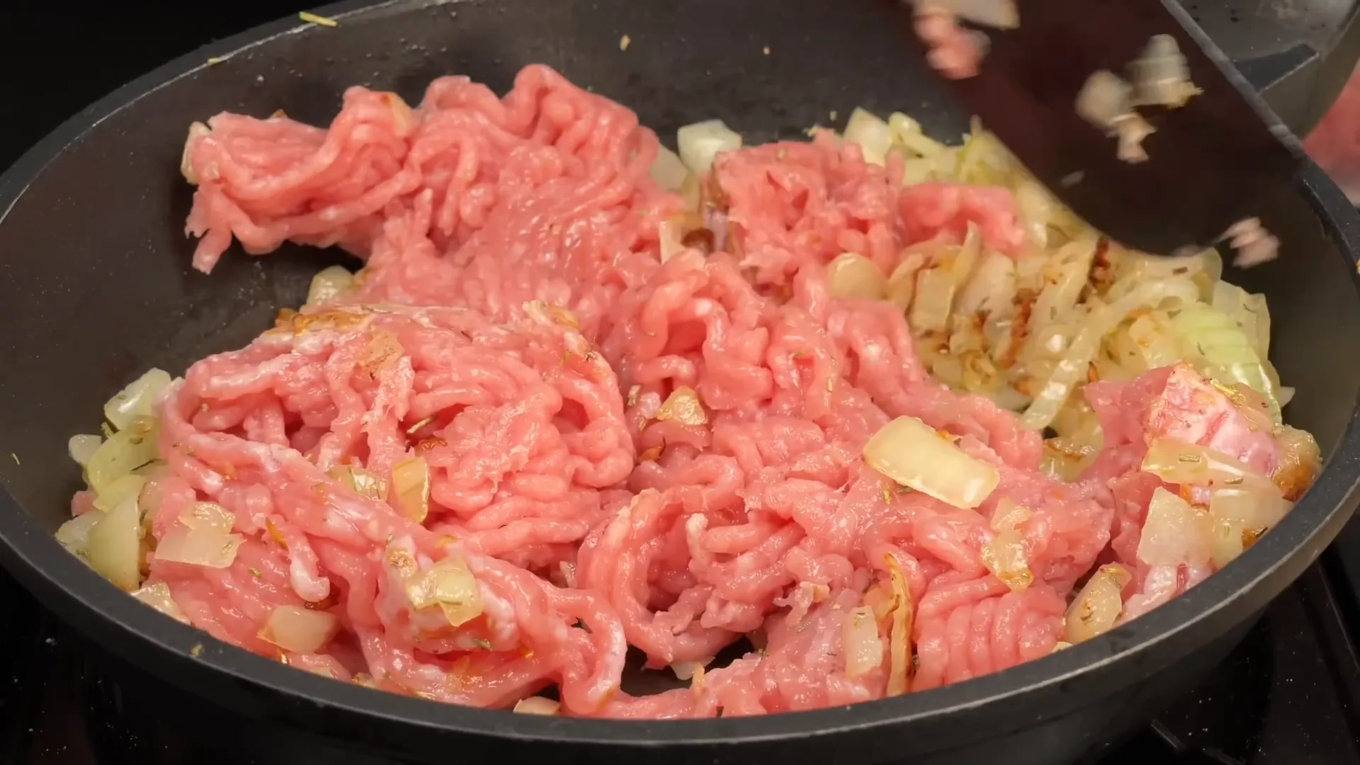 Cooking ground beef with onions