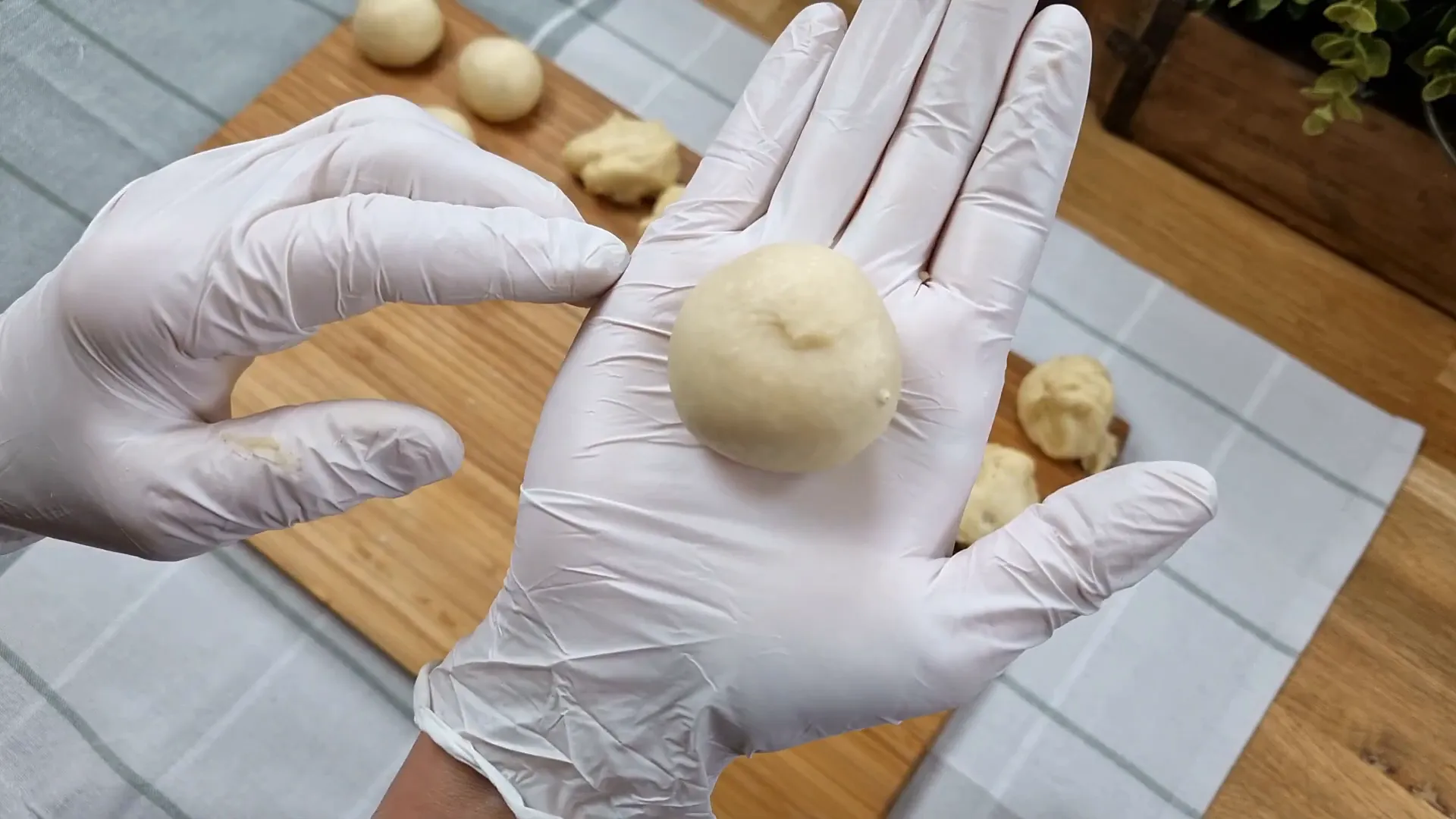 Shaping dough into a round ball