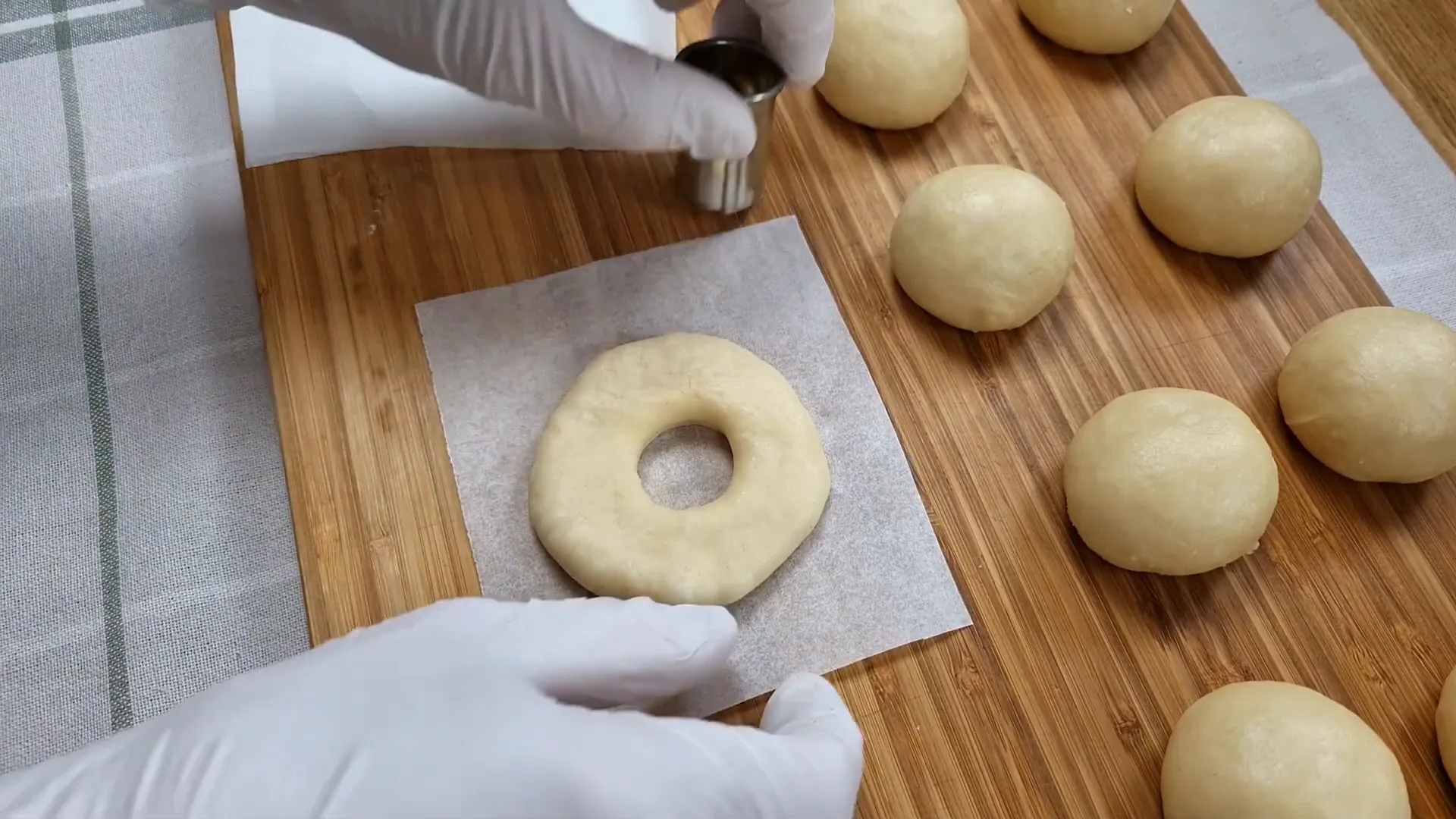 Pressing dough to create a hole