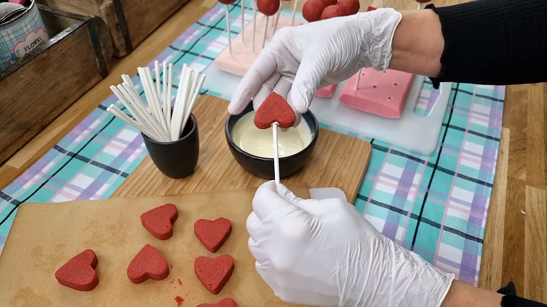 Inserting sticks into cake pops